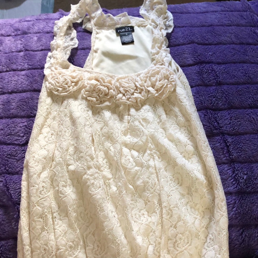 cream tank top with rose buds on the neckline